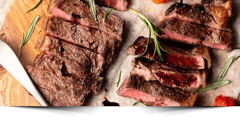 Seared New York Strip Steak with Red Wine Balsamic Reduction